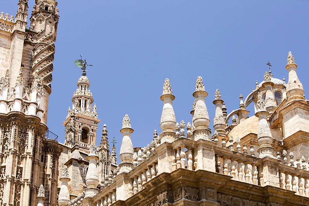 A part of the roof line of Seville Cathedral, UNESCO World Heritage Site, Seville, Andalucia, Spain, Europe