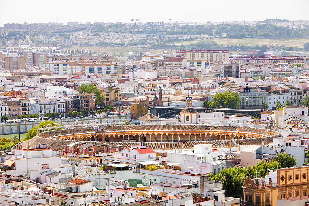 A view from the bell tower of Seville cathedral overlooking the city and the bull ring, Seville, Andalucia, Spain, Europe