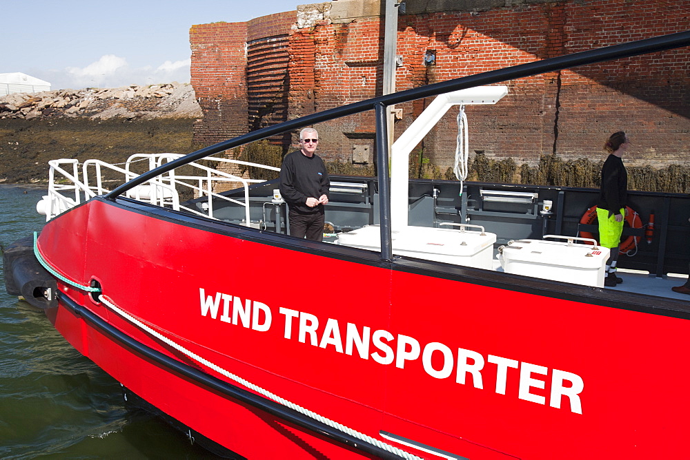 The Wind Transporter, a new support vessel to transport workers to The Walney Offshore Windfarm, 15km off Barrow in Furness in Cumbria, England, United Kingdom, Europe