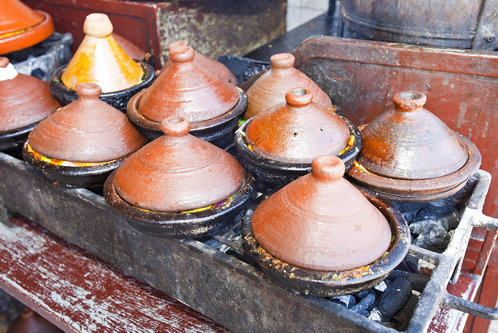 Tagines cooking on a cafe stove in Marrakech, Morocco, North Africa, Africa