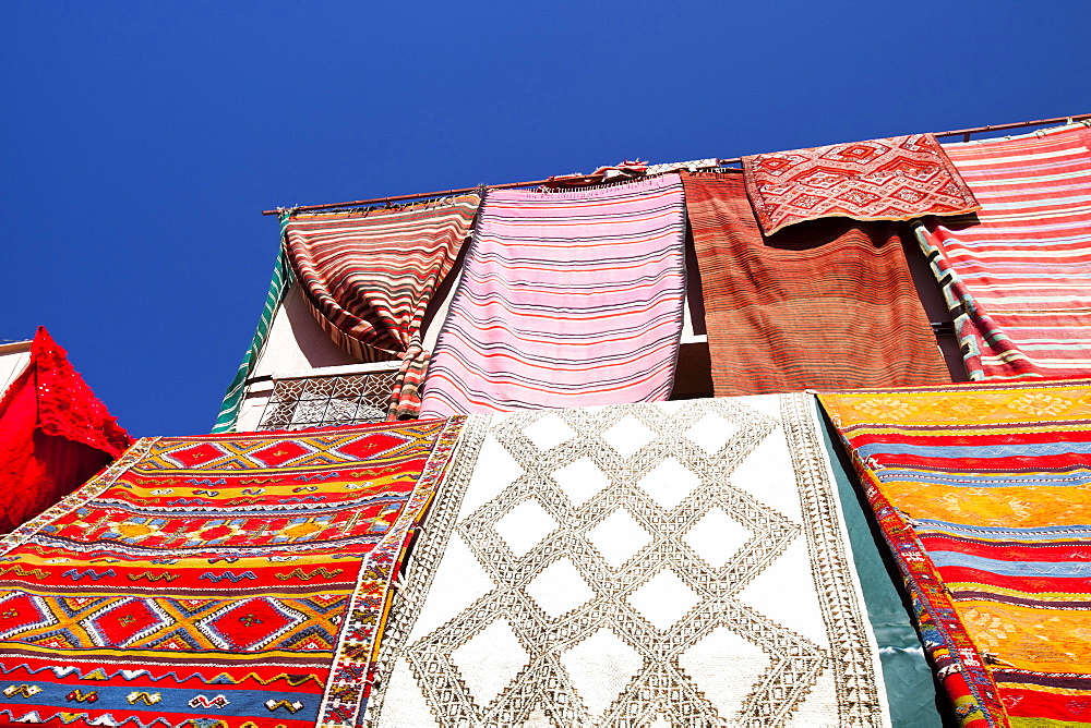 Cloth hanging up a souk in Marrakech, Morocco, North Africa, Africa