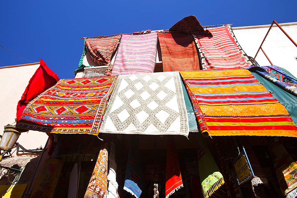 Cloth hanging up a souk in Marrakech, Morocco, North Africa, Africa