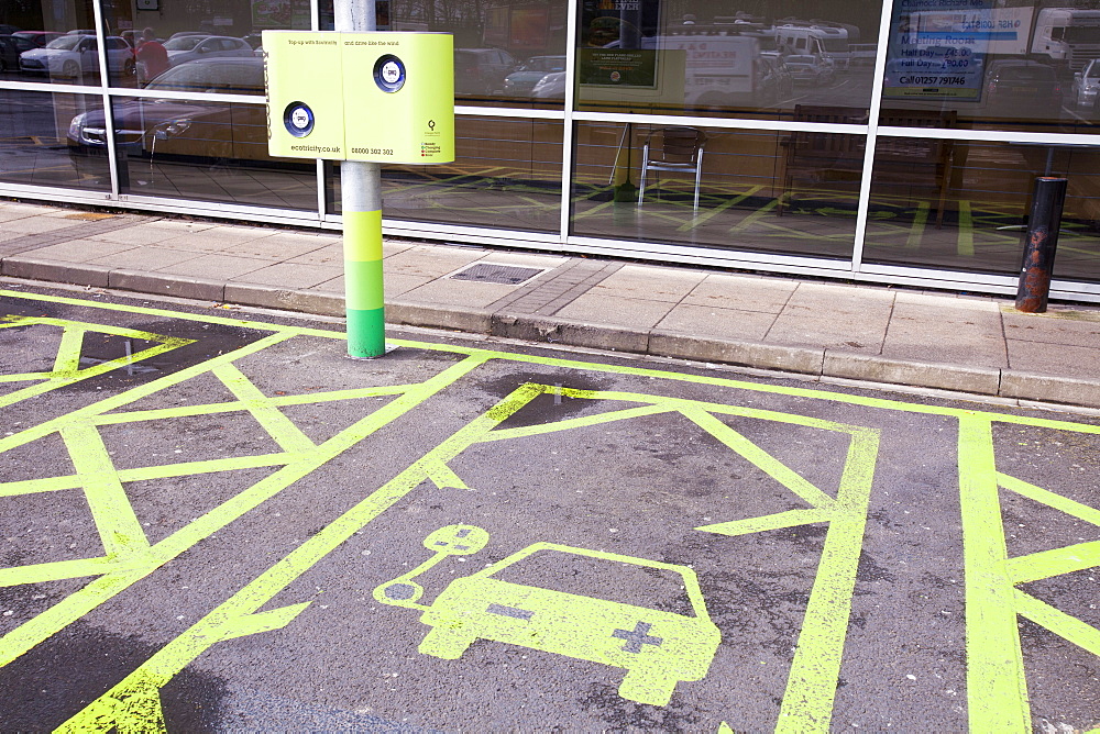 An electric car recharging station at the Charnock Richard M6 motorway service station, Lancashire, England, United Kingdom, Europe