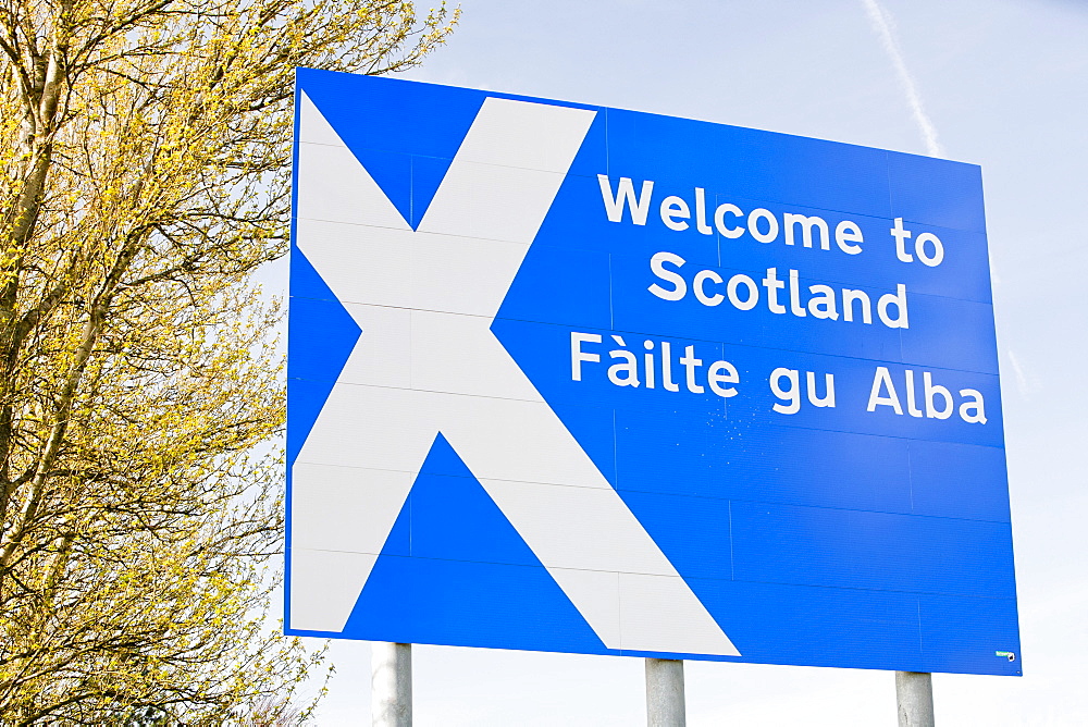 A welcome to Scotland sign on the side of the M74 at Gretna Green, Dumfries and Galloway, Scotland, United Kingdom, Europe