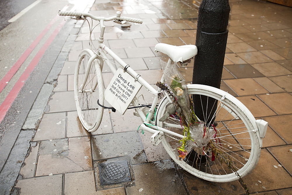 A ghost bike tribute to the cyclist Deep Lee who died on the streets at Kings Cross when she was hit by a lorry, London, England, United Kingdom, Europe