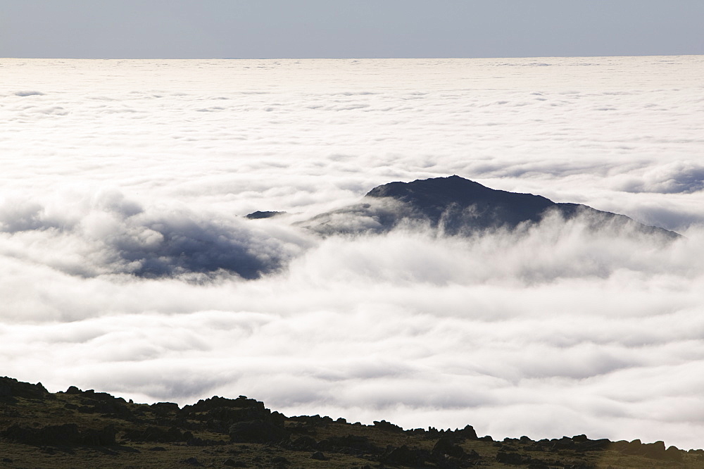 A temperature inversion leading to valley mist on Wet Side Edge, looking towards Harter Fell, Lake District National Park, Cumbria, England, United Kingdom, Europe