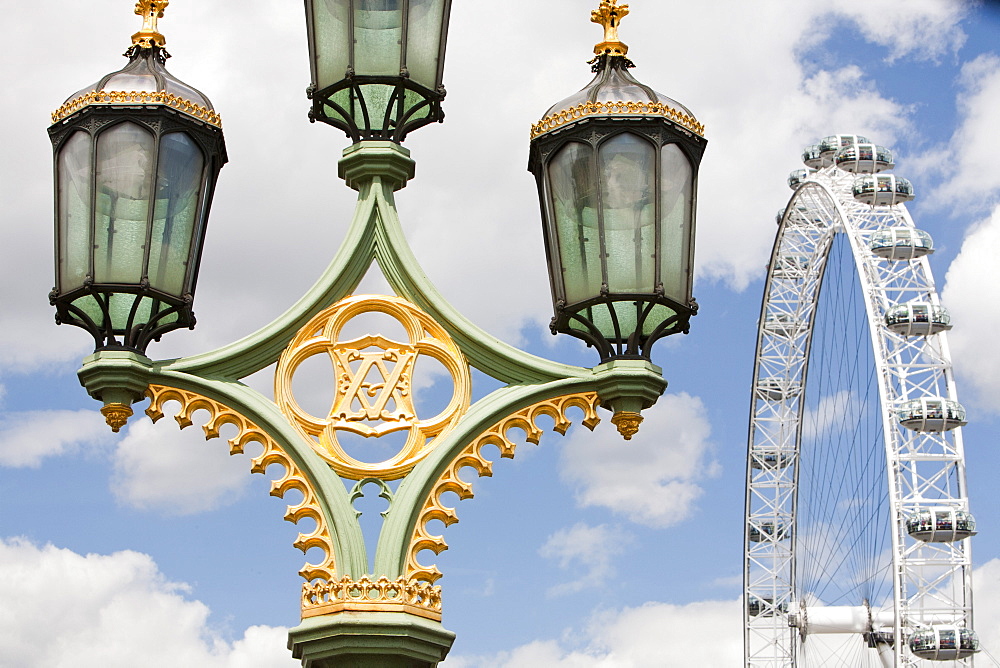 The London Eye on the South Bank,with Victorian street lights in the foreground, London, England, United Kingdom, Europe