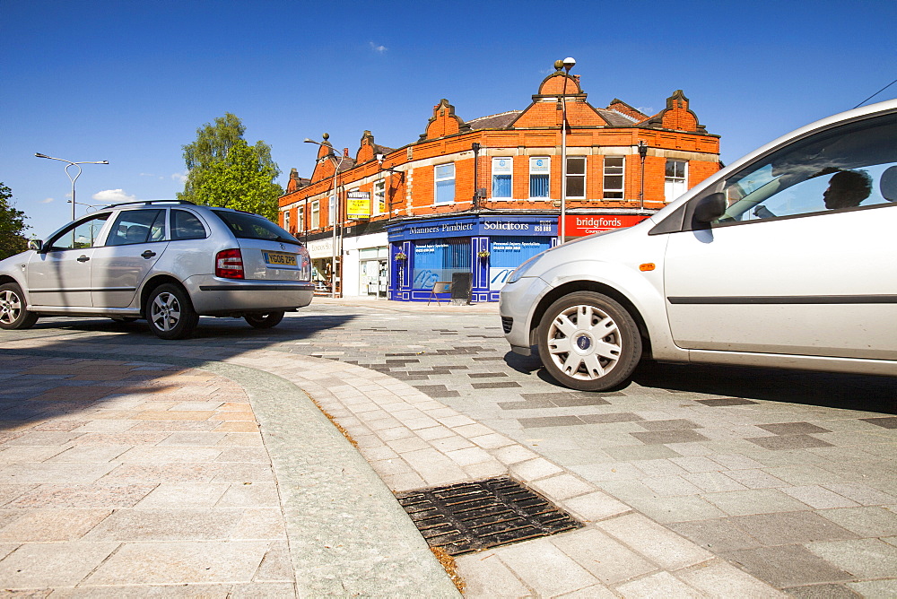 A shared space road experiment, where pedestrians and vehicles share the same space, Poynton village, Cheshire, England, United Kingdom, Europe