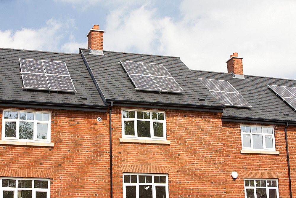 Solar panels on new build housing in Macclesfield, Cheshire, England, United Kingdom, Europe