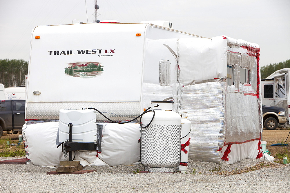 Insulated RV's and trailers where workers from the tar sands industry live north of Fort McMurray, Alberta, Canada, North America