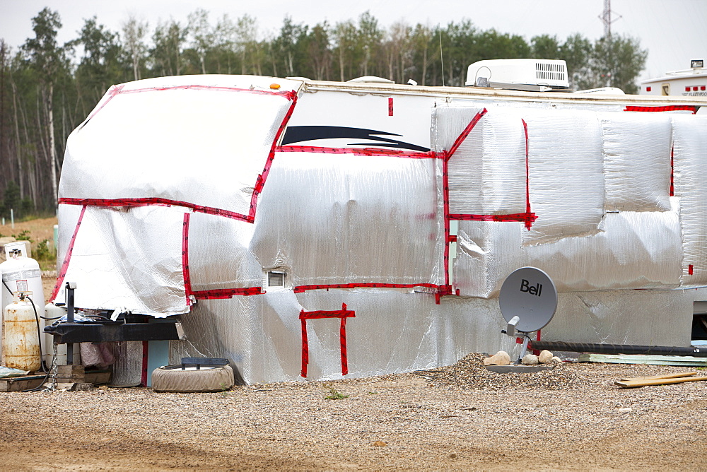 Insulated RV's and trailers where workers from the tar sands industry live north of Fort McMurray, Alberta, Canada, North America