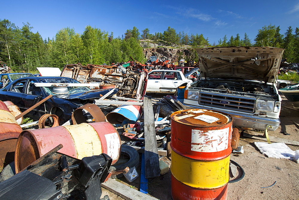 A scrap metal dump in Fort Chipewyan, Alberta, Canada, North America