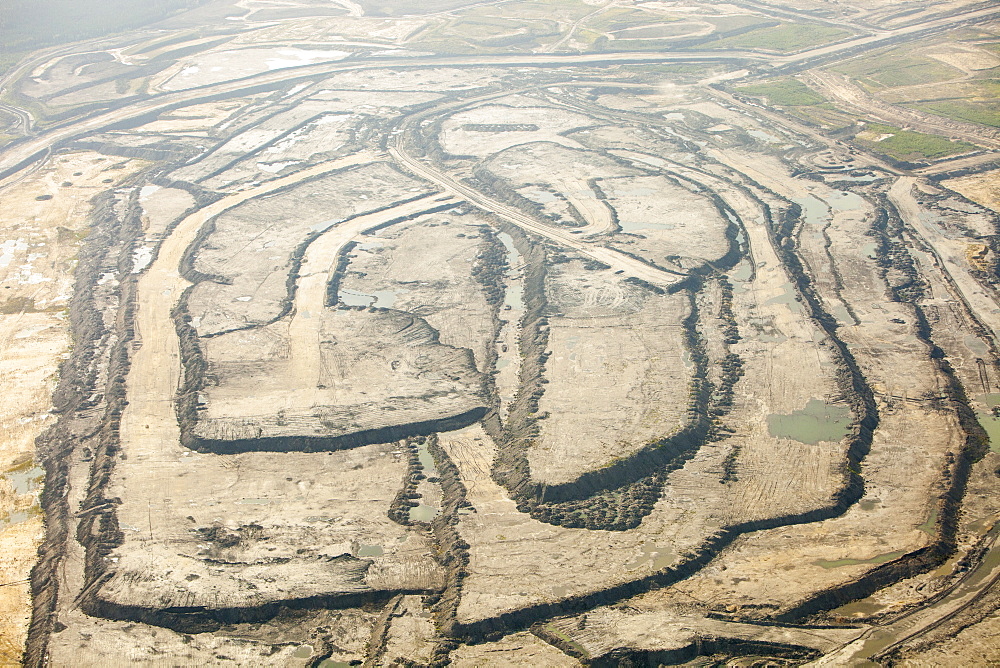 Tar sands deposits being mined at the Syncrude mine north of Fort McMurray, Alberta, Canada, North America