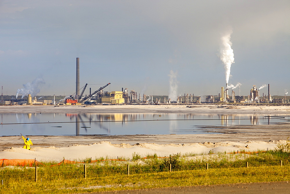 The tailings pond at the Syncrude mine north of Fort McMurray, Alberta, Canada, North America