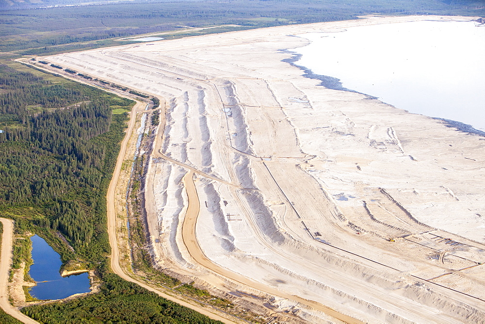 The tailings pond at the Syncrude mine north of Fort McMurray, Alberta, Canada, North America