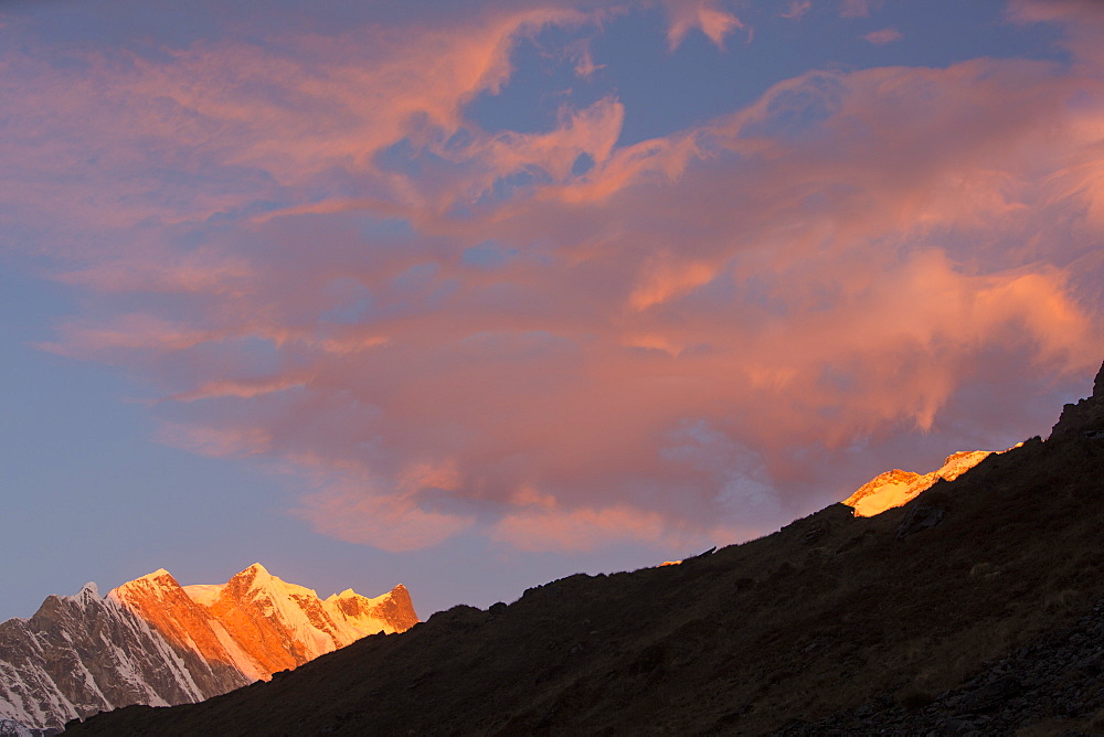 Alpenglow at sunrise on Annapurna Fang, Nepalese Himalayas, Nepal, Asia