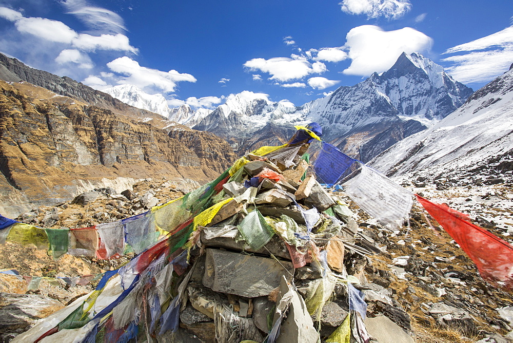 Prayer flags at Annapurna Base Camp at 4130 metres looking towards Machapuchare, Annapurna Sanctuary, Himalayas, Nepal, Asia