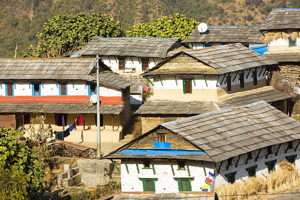 The ancient traditional village of Ghandruk beneath Annapurna South in the Nepalese Himalayas, Nepal, Asia