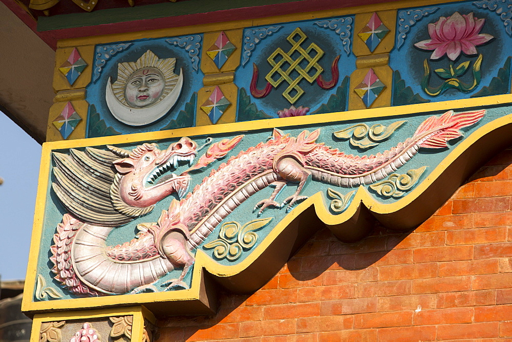 A dragon carving on a building in Kathmandu, Nepal, Asia