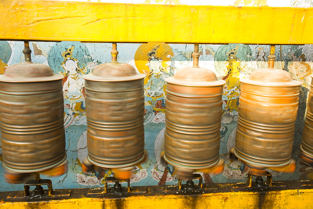 Prayer wheels at the Boudhanath Stupa, one of the holiest Buddhist sites in Kathmandu, Nepal, Asia