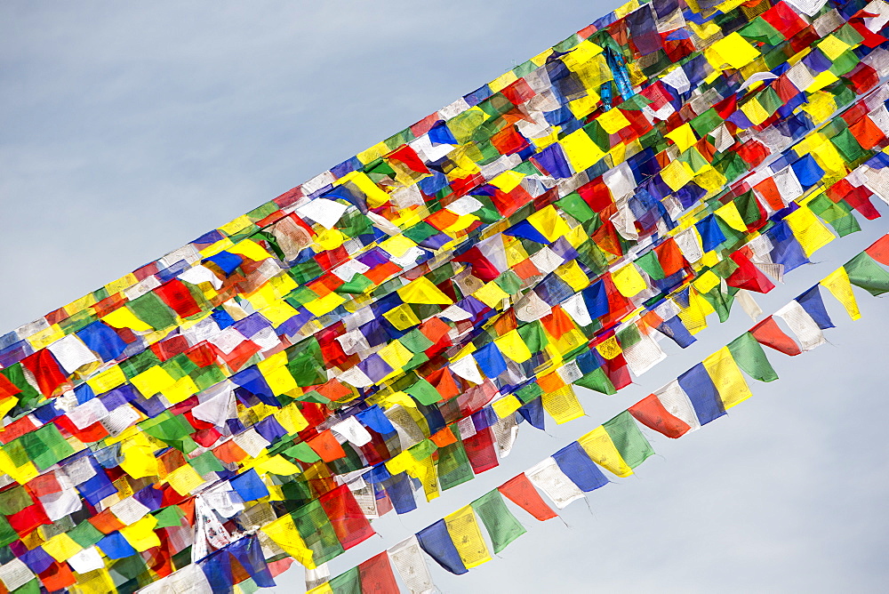 Prayer flags at the Boudhanath Stupa, one of the holiest Buddhist sites in Kathmandu, Nepal, Asia