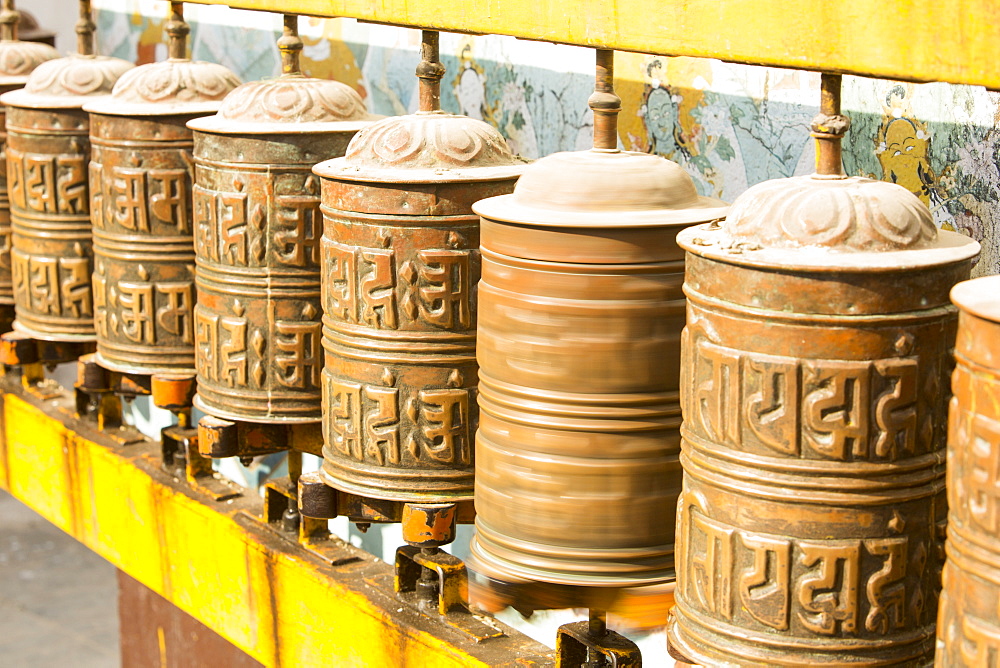 Prayer wheels at the Boudhanath Stupa, one of the holiest Buddhist sites in Kathmandu, Nepal, Asia