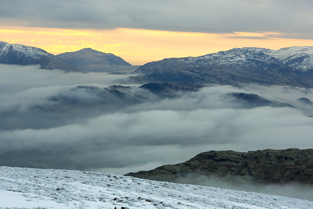 Red Screes above Ambleside with mist from a temperature inversion, looking towards Harter Fell, Lake District National Park, Cumbria, England, United Kingdom, Europe