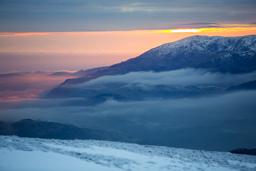 Red Screes above Ambleside with mist from a temperature inversion, looking towards Coniston Old Man, Lake District National Park, Cumbria, England, United Kingdom, Europe