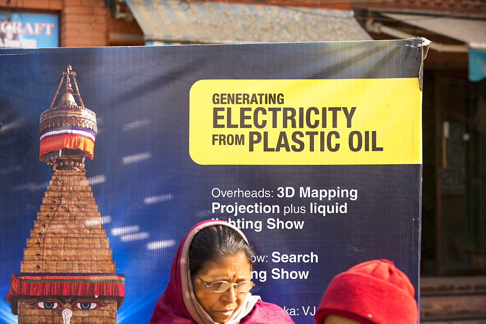 A machine used for turning plastic into oil, to generate electricity is demonstrated to crowds in Kathmandu, Nepal, Asia