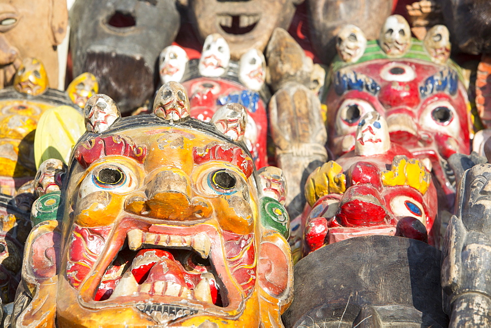 Nepalese face masks for sale at a stall in Patan's Durbar Square, Kathmandu, Nepal, Asia