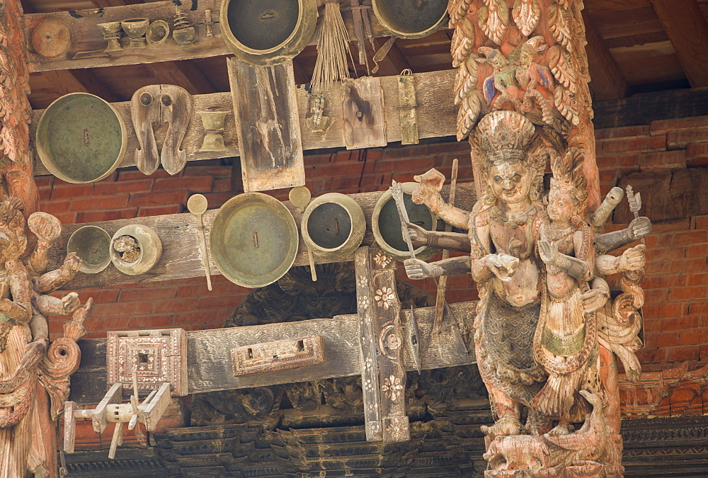 Ancient ornately carved woodwork on an old building in Kathmandu's Durbar Square, UNESCO World Heritage Site, Kathmandu, Nepal, Asia