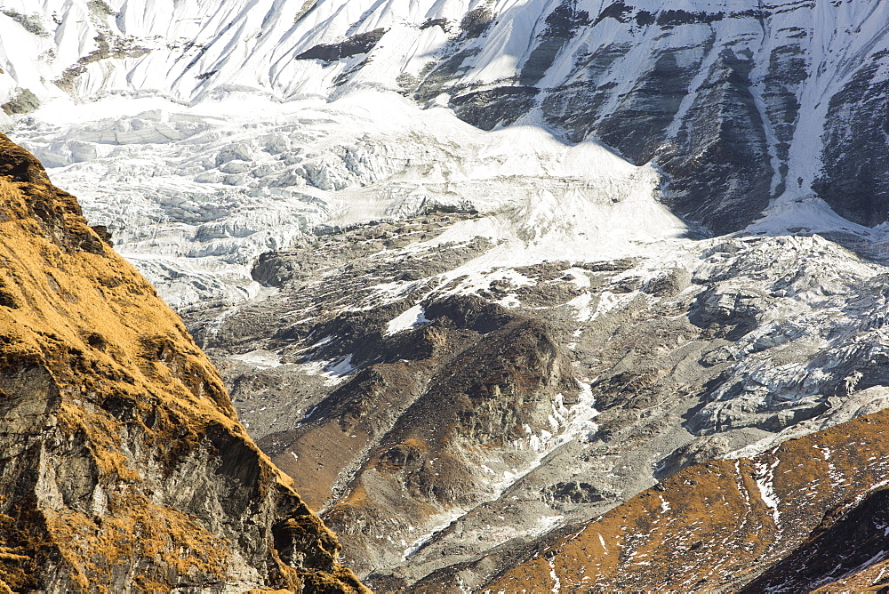 A rapidly retreating glacier on the side of the 6428 metre peak of Gandharwa Chuli in the Annapurna Sanctuary, Nepalese Himalayas, Nepal, Asia