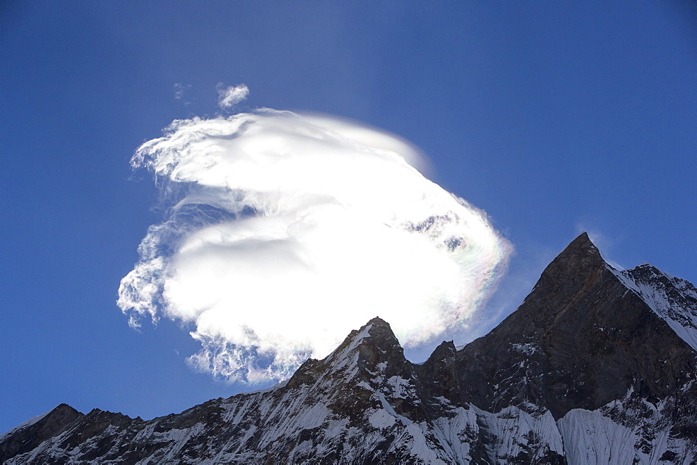 Jet stream winds over Machapuchare in the Annapurna Himalayas in Nepal, Asia