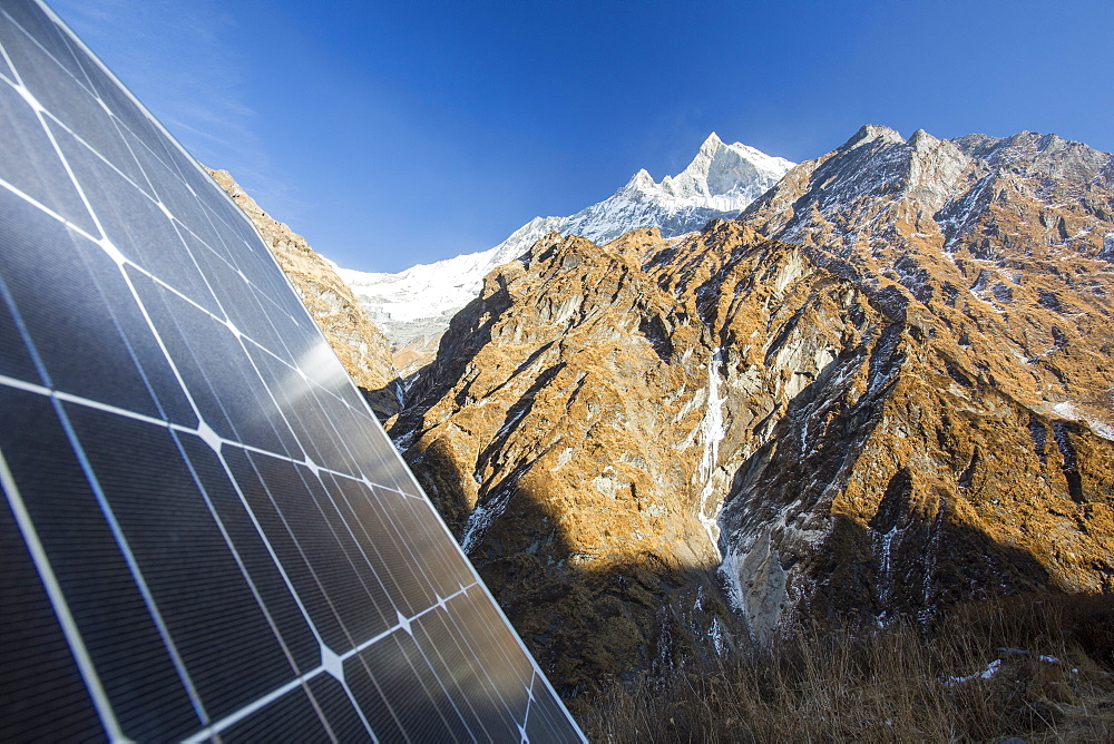 An automated weather station being powered by solar panels at Machapuchare Base Camp, Himalayas, Nepal, Asia