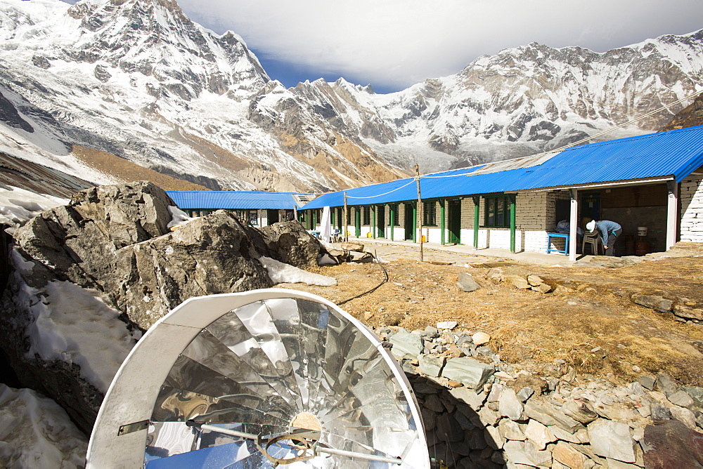 A solar cooker for baking bread at Annapurna Base Camp, Himalayas, Nepal, Asia