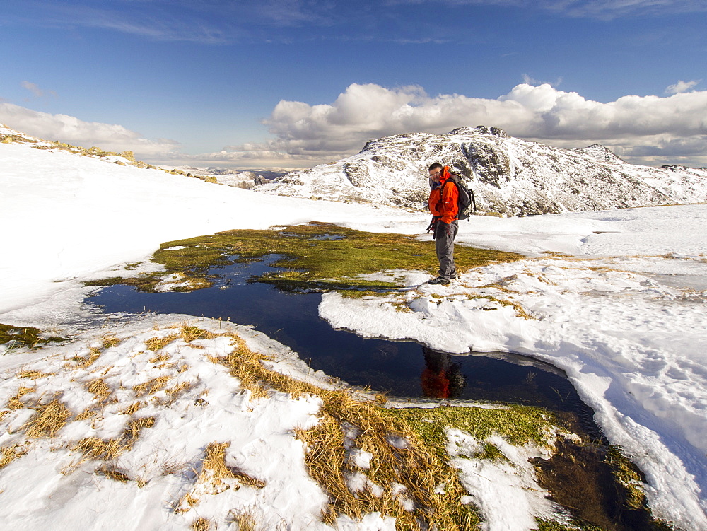 A spring near Esk Hause, which is the start of the River Esk, near Great End, Lake District, Cumbria, England, United Kingdom, Europe