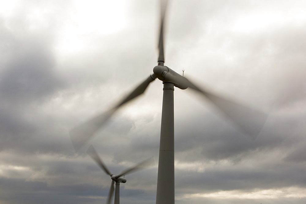 Wind turbines at a wind farm near Amlwych on Anglesey, Wales, United Kingdom, Europe