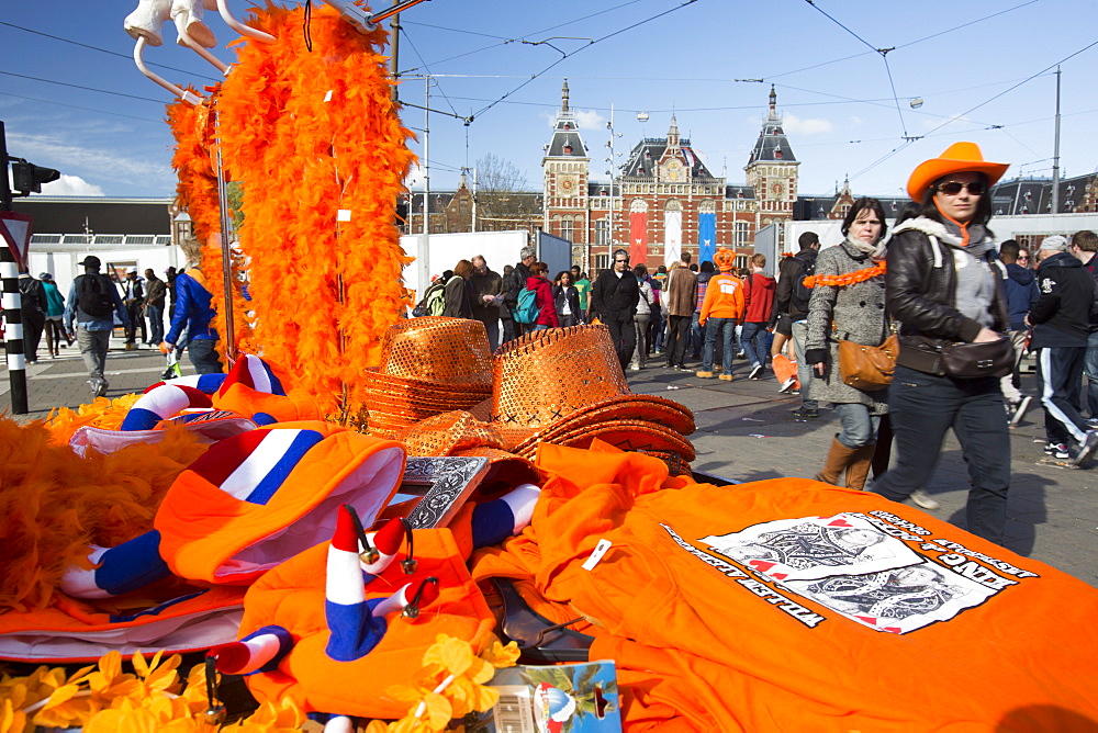 A stall selling orange clothing to celebrate Queens Day in Amsterdam, Netherlands, Europe