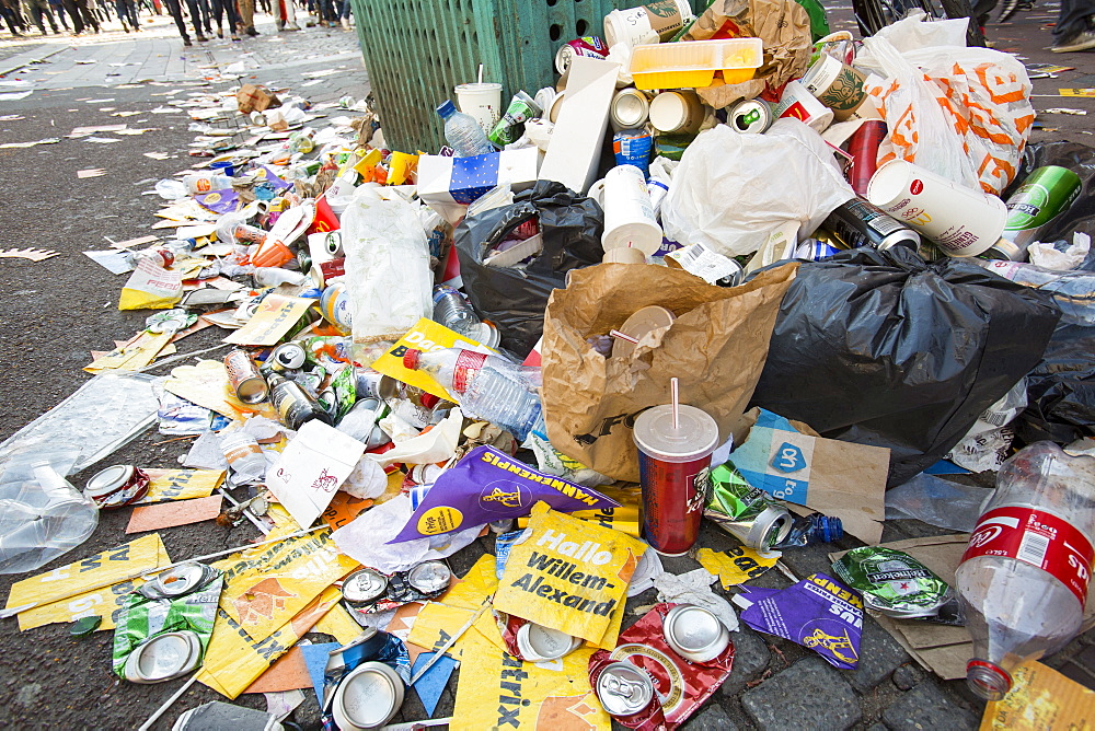 Litter on the streets of Amsterdam following the annual Queens Day celebrations, Netherlands, Europe