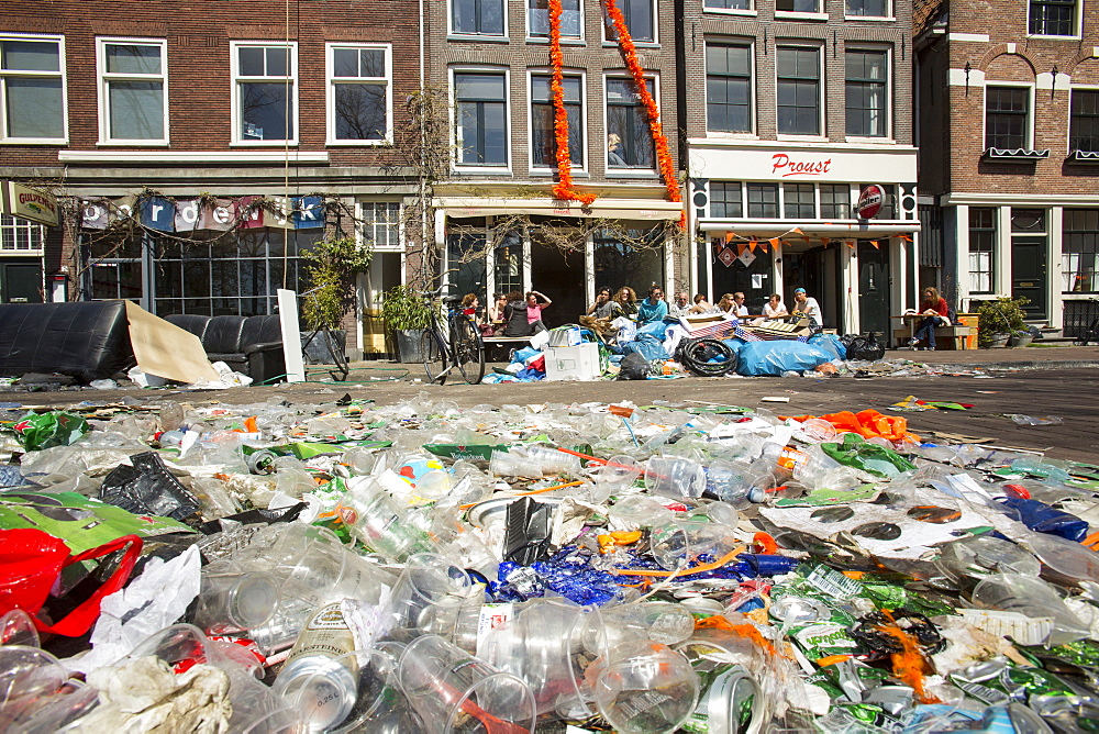 Litter on the streets of Amsterdam following the annual Queens Day celebrations, Netherlands, Europe