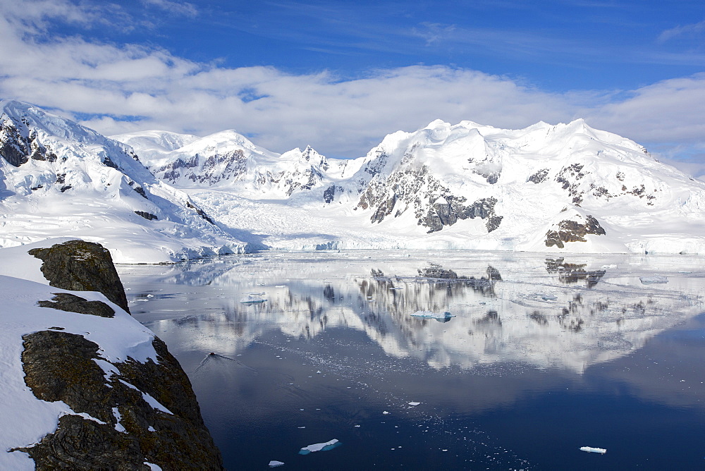 Stunning coastal scenery beneath Mount Walker in Paradise Bay off Graham Land on the Antarctic Peninsular. the Peninsular is one of the most rapidly warming places on the planet.