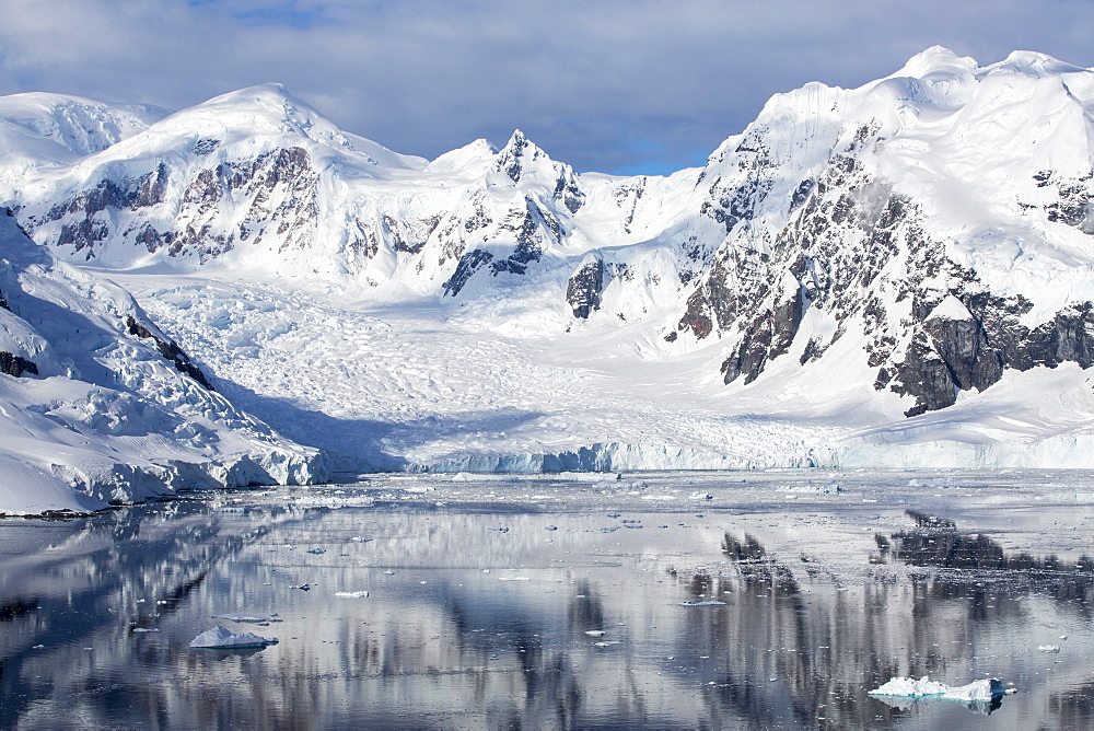 Stunning coastal scenery beneath Mount Walker in Paradise Bay off Graham Land on the Antarctic Peninsular. the Peninsular is one of the most rapidly warming places on the planet.