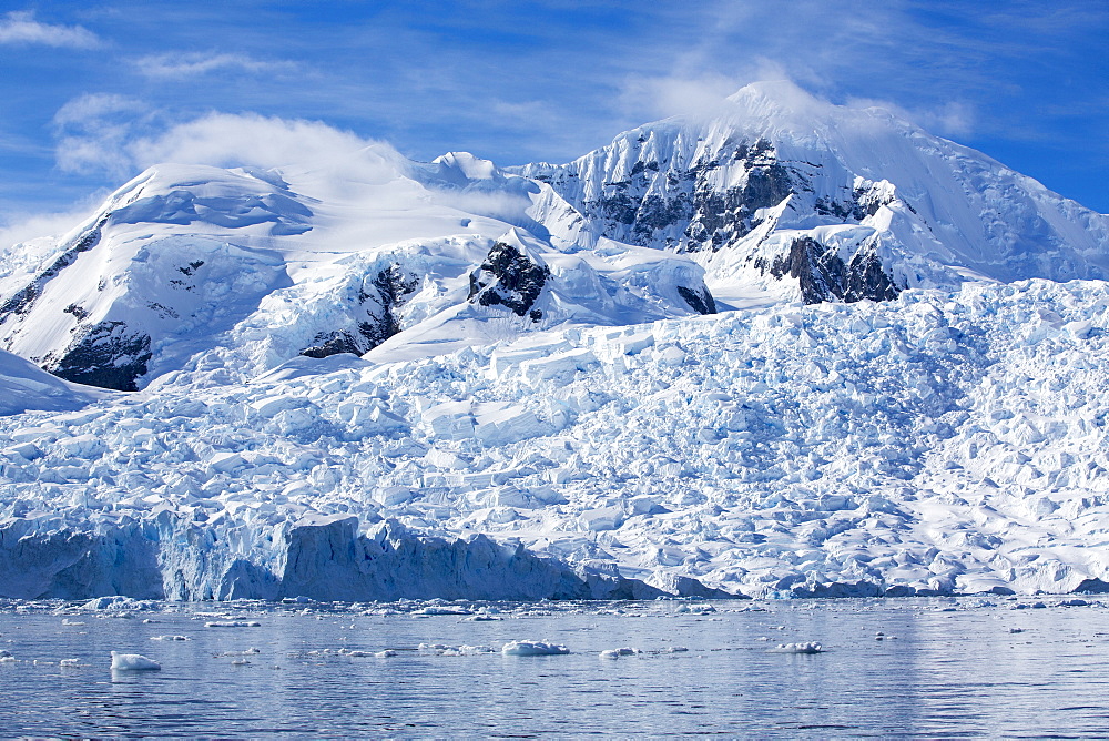 Stunning coastal scenery beneath Mount Walker in Paradise Bay off Graham Land on the Antarctic Peninsular. the Peninsular is one of the most rapidly warming places on the planet.