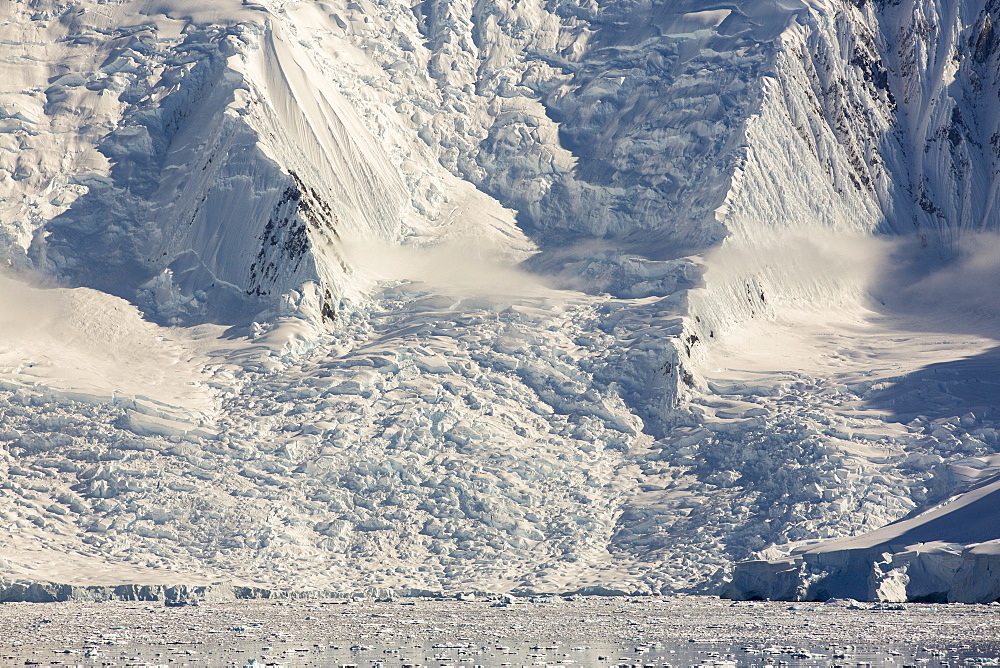 The Gerlache Strait separating the Palmer Archipelago from the Antarctic Peninsular off Anvers Island. The Antartic Peninsular is one of the fastest warming areas of the planet.