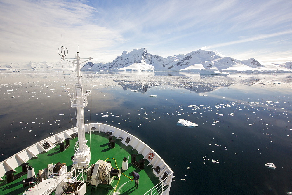 The deck of the Akademik Sergey Vavilov, an ice strengthened ship on an expedition cruise to Antarctica, off the Antarctic Peninsular at the Gerlache Strait. The Antarctic Peninsular is one of the most rapidly warming places on the planet.