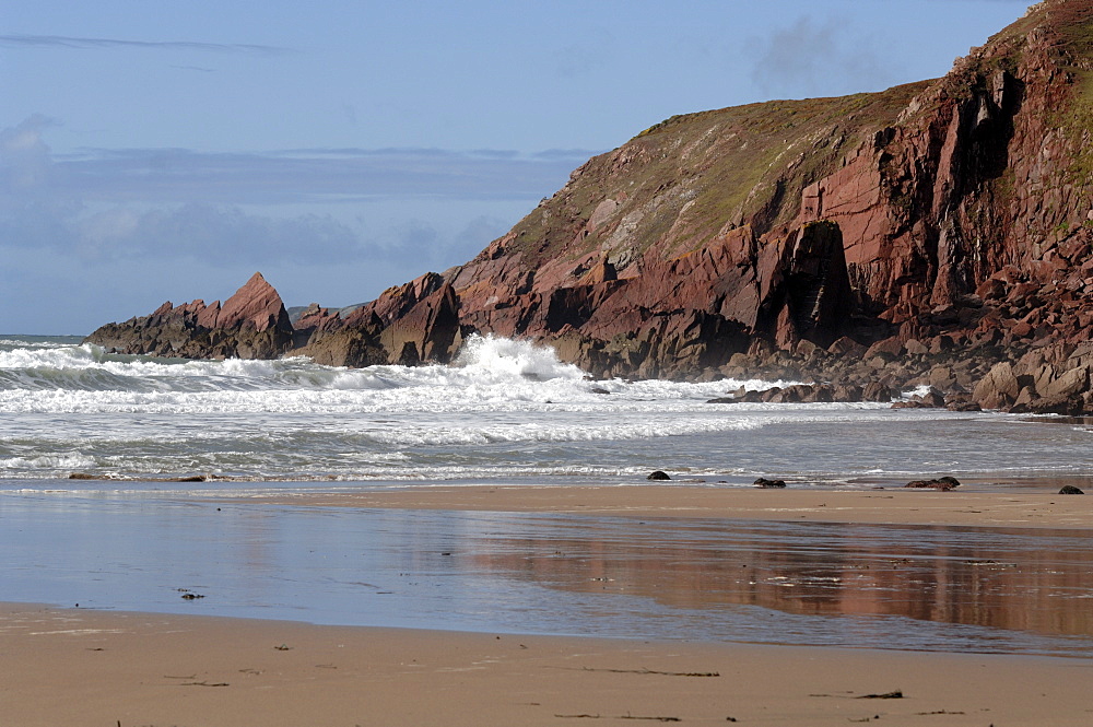 Waves and cliff, West Dale beach, Dale, Pembrokeshire, Wales, UK, Europe