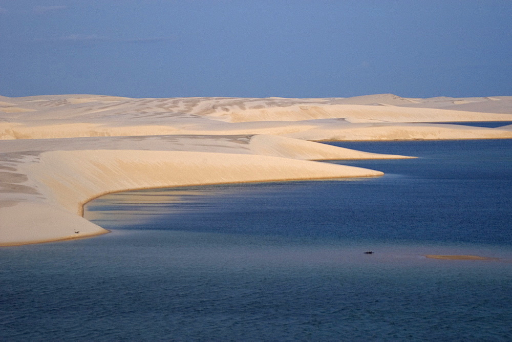 Sand dunes around Gaivota Lake at Lencois Maranhenses National Park, Santo Amaro, Maranhao, Brazil, South America