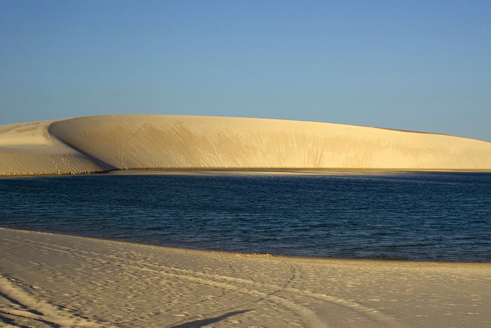 Sand dunes around Gaivota Lake at Lencois Maranhenses National Park, Santo Amaro, Maranhao, Brazil, South America