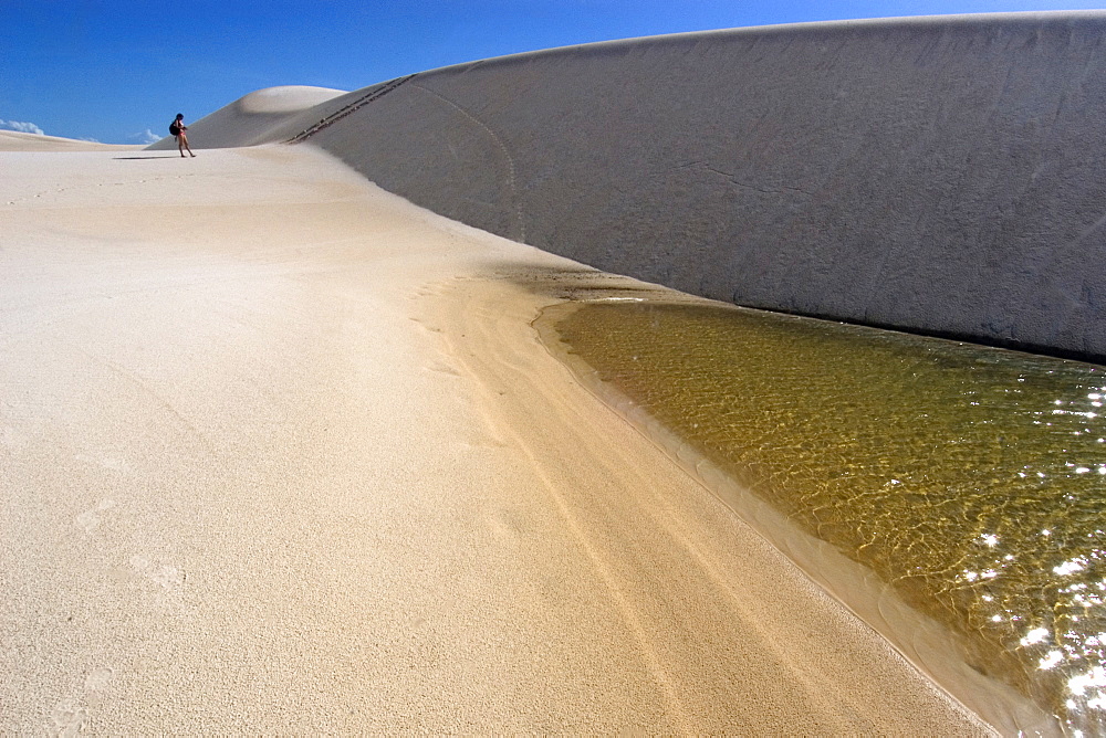 Sand dunes and lake of Lencois Maranhenses National Park, Santo Amaro, Maranhao, Brazil, South America