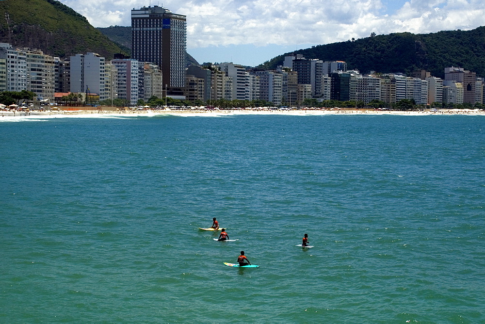 Surfers at Copacabana Beach, Rio de Janeiro, Brazil, South America